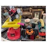 Four Toy Trucks and Train