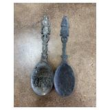 Two Decorative Metal Relief Spoons