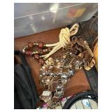 Jewelry Including Bead Necklace and Carved Bracele