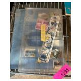 Postage Stamps in Plastic Storage Box