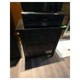 Black Two-Drawer Cabinet with Remotes