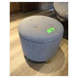 Gray Upholstered Round Ottoman
