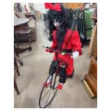 Animated Creepy Doll on Tricycle Display