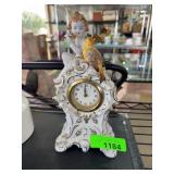 Porcelain Cherub Mantel Clock with Bird