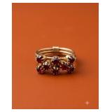 Gold Tone Ring with Red Stone Settings