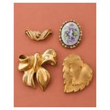 Four Gold Tone Brooches