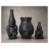 Three Black Glass Figurine Vessels