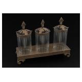 Three Glass Containers in Ornate Stand