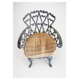 Ornate Metal Armchair with Plaid Cushion