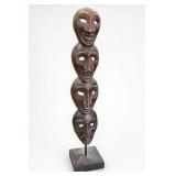 Carved Wooden Four-Face Mask Sculpture