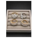 Four Mixed-Metal Cluster Rings