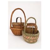 Three Wicker Baskets With Handles