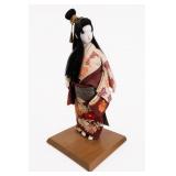 Japanese Geisha Doll On Wood Base