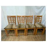 Four Wood Chairs with Leopard Upholstery