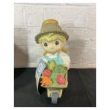 Precious Moments Figurine with Wheelbarrow Precious Moments Figurine with Wheelbarrow