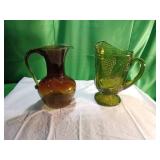 Two-Handed Glass Pitchers in Amber and Green Two-Handed Glass Pitchers in Amber and Green