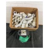 PVC Pipe Fittings and Green Electrical Wire PVC Pipe Fittings and Green Electrical Wire