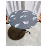 Round Table with Butterfly Motif and Metal Base
