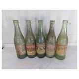 Five Royal Crown Cola Bottles