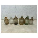 6 Clear and Green Glass Jugs With Handles