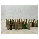 24 Assorted Soda Bottles from Roanoke