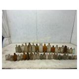 46 Glass Bottles in Assorted Shapes