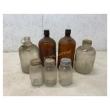 7 Glass Bottles with Mixed Designs