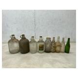 9 Assorted Glass Bottles and Jugs