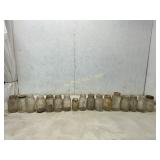 18 Glass Jars with Varied Marks and Lids
