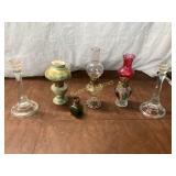 Six Oil Lamps and Candleholders