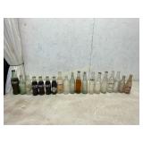 19 Bottles Including Coca-Cola and Others