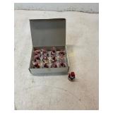 12 Black Americana Red and White Figurines