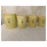 Four Vintage Tupperware Canisters