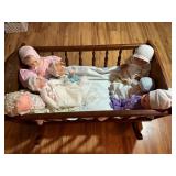 Wooden Doll Cradle with 7 Vintage Dolls