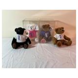 Four Collectible Plush Bears