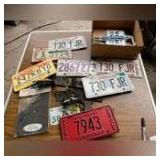Assortment of License Plates and Holders