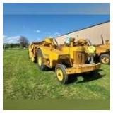 John Deere 840 tractor and John Deere scraper