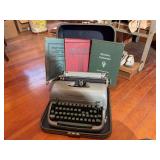 Remingto Typewriter in case with books