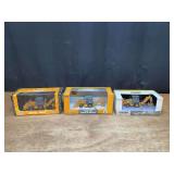 (3) 1/50 Case Backhoes NIB Ertl