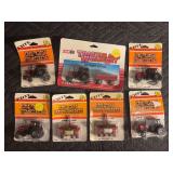 (7) 1/64 Case International 94 Series Tractors and Implements Ertl