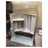 Merchandisers - the bottom case has a glass front and glass shelf 43” W x 23” T