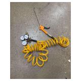 This is a high-flow nitrogen regulator kit, which includes a regulator, gauges, an air hose, and a blow gun.