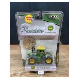 1/64 John Deere 7020 Muddy Premier NIB Ertl