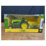 1/16 John Deere 730 + Blade Prestige NIB Ertl
