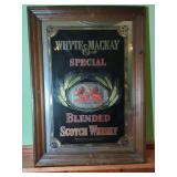 27" W x 34" T... Whyte&Mackey mirrored Sign