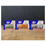 (3) 1/64 Trucks NIB