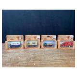 (4) 1/64 Trucks NIB