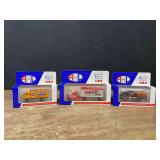 (3) 1/64 Trucks NIB