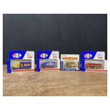 (4) 1/64 Trucks NIB