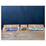 (3) 1/64 Trucks NIB